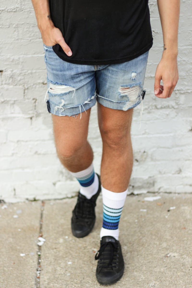 The Kentucky Gent in American Apparel V-Neck, Levi's Cut Off Shorts, Ray-Ban Wayfarers, Converse Chucks, and Richer Poorer Striped Athletic Socks.