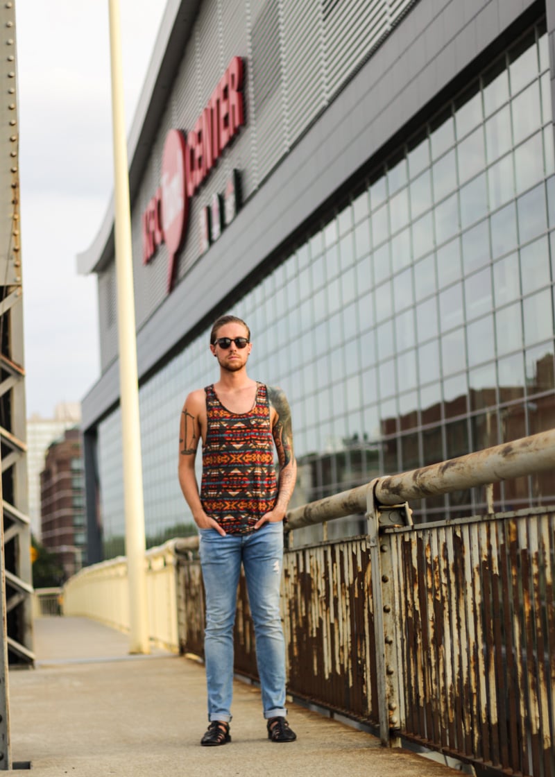 The Kentucky Gent in Original Penguin Briscoe Sunglasses, Obey Tank Top, H&M Light Washed Denim, and Zara Sandals.