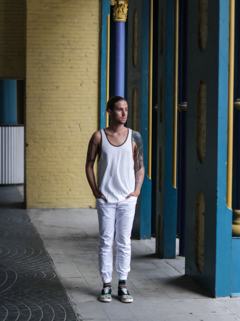 The Kentucky Gent in BDG Tank Top from Urban Outfitters, H&M White Twill Pants, Richer Poorer Socks, and Bucket Feet Shoes.