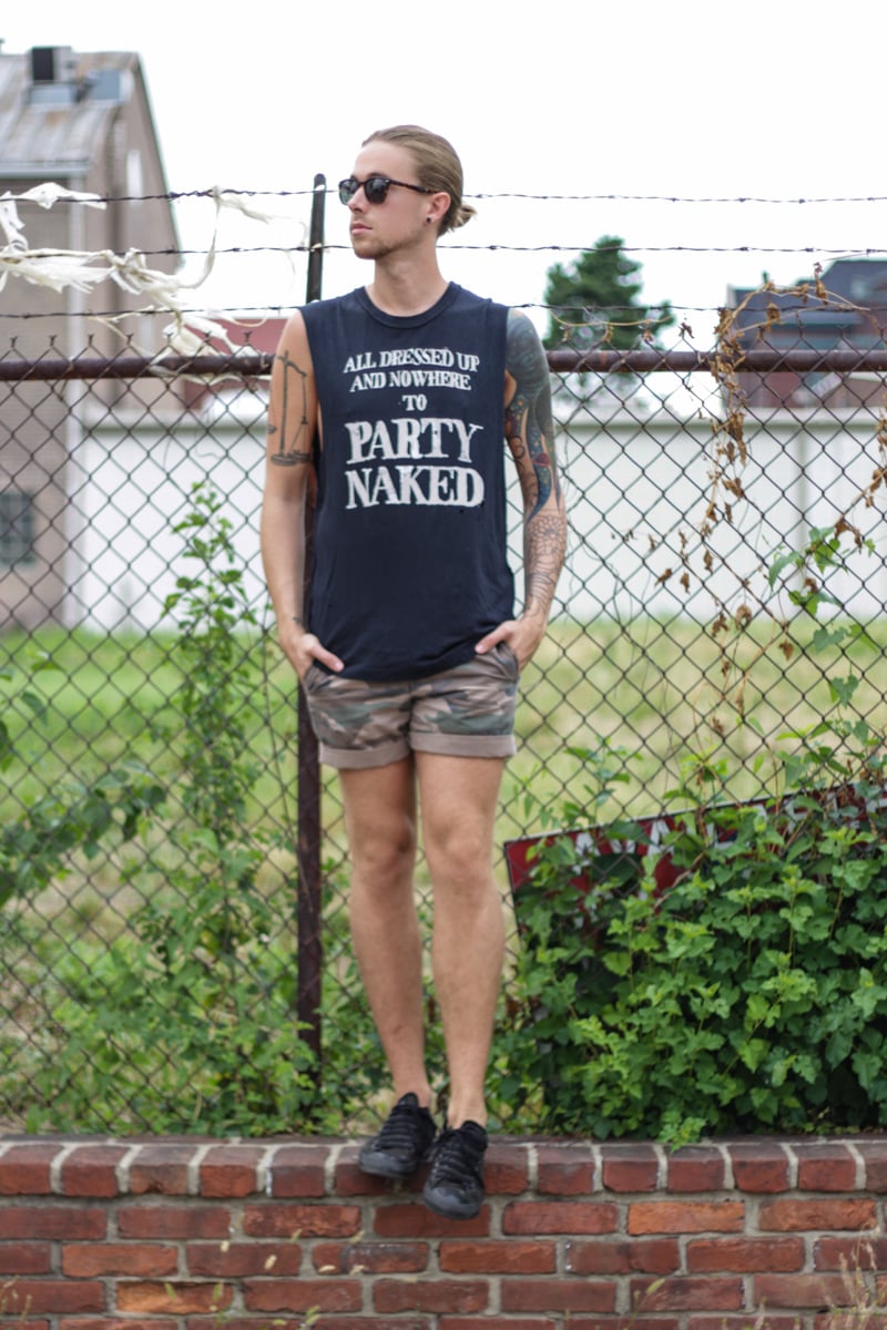 The Kentucky Gent in UNIF Tank Top, Topman Camo Shorts, and Converse Chuck Taylors.