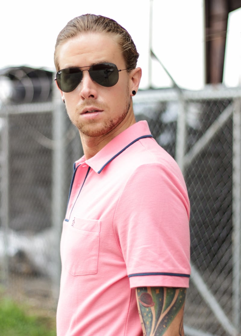 The Kentucky Gent in Original Penguin Pink Polo Shirt, Dockers Camouflage Pants, Bucketfeet Slip On Shoes, and Ray-Ban Aviator Sunglasses.
