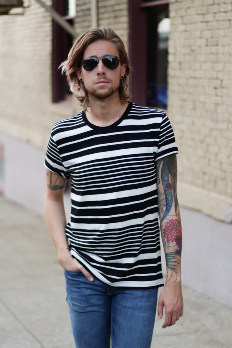 The Kentucky Gent, a men's fashion and life style blogger, in BDG Striped T-Shirt, Levi's 511 Jeans, Dr. Martens Combat Boots, and Ray-Ban Aviator Sunglasses.