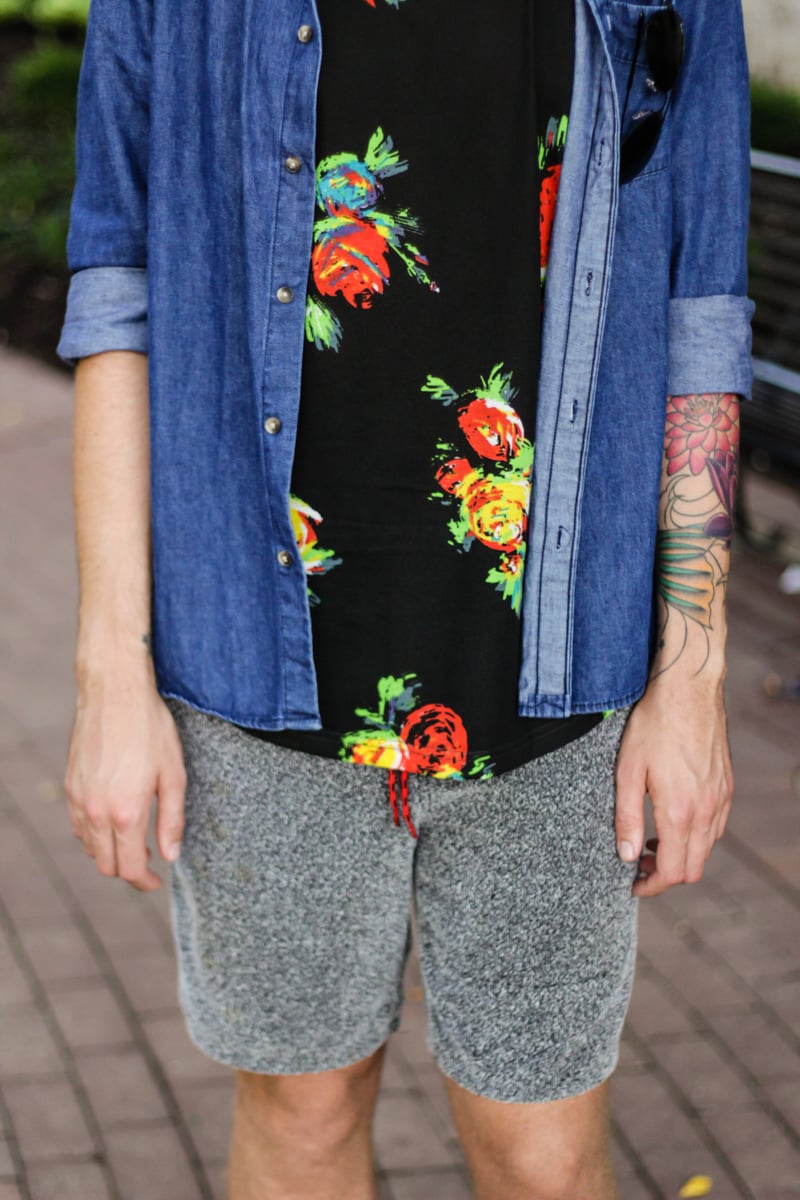The Kentucky Gent, a men's southern life and style blogger, in H&M Denim Shirt, BDG Floral Tank Top, Urban Outfitters Sweatpant Shorts, Ray-Ban Aviator Sunglasses from East Dane, and Converse Chuck Taylors.