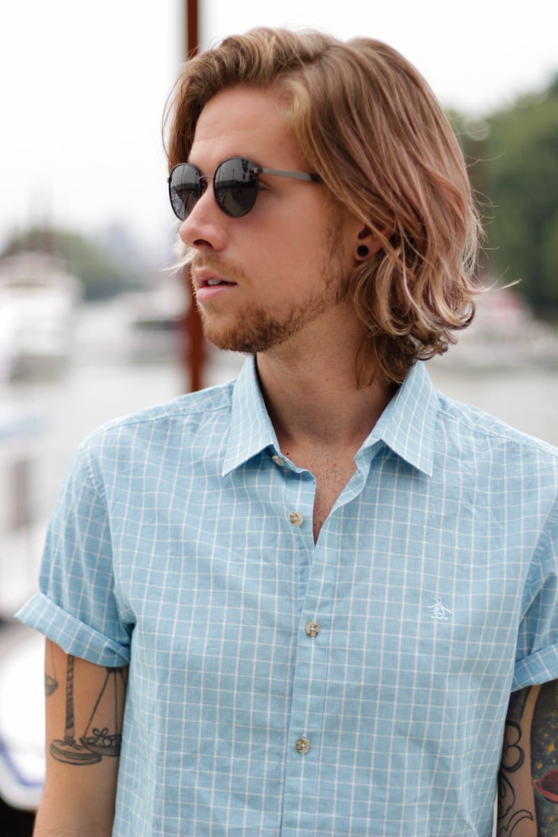 The Kentucky Gent, a men's southern life and style blogger, in Original Penguin Shirt, H&M White Twill Pants, Zara Sandals, and Original Penguin Sunglasses.