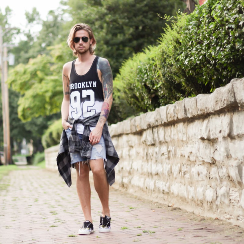 The Kentucky Gent, a southern men's life and style blogger, in Urban Outfitters Tank Top, Devil's Harvest Plaid Shirt, Levi's Cut Off Denim Shorts, Bucketfeet Sneakers, and Ray-Ban Aviators from East Dane.