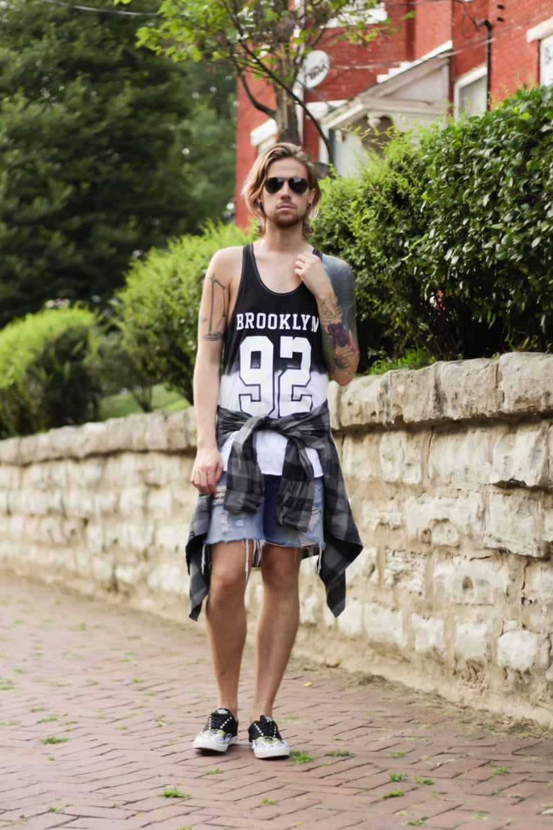 The Kentucky Gent, a southern men's life and style blogger, in Urban Outfitters Tank Top, Devil's Harvest Plaid Shirt, Levi's Cut Off Denim Shorts, Bucketfeet Sneakers, and Ray-Ban Aviators from East Dane.