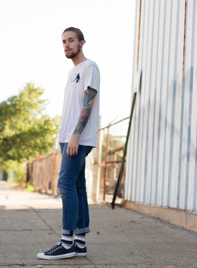 The Kentucky Gent, a men's fashion and life style blogger, in UNIF T-Shirt, Levi's 511 Jeans, Converse Chuck Taylors, and Richer Poorer Socks.
