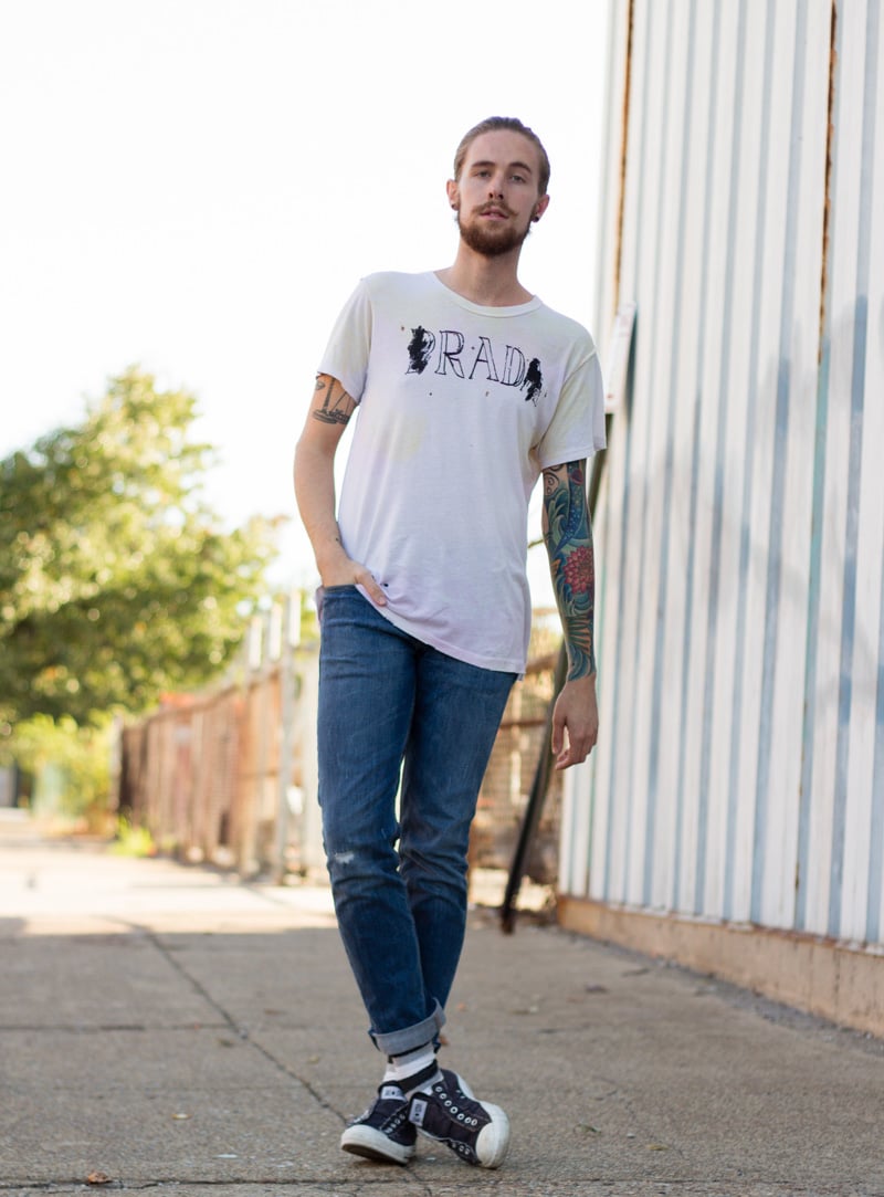 The Kentucky Gent, a men's fashion and life style blogger, in UNIF T-Shirt, Levi's 511 Jeans, Converse Chuck Taylors, and Richer Poorer Socks.