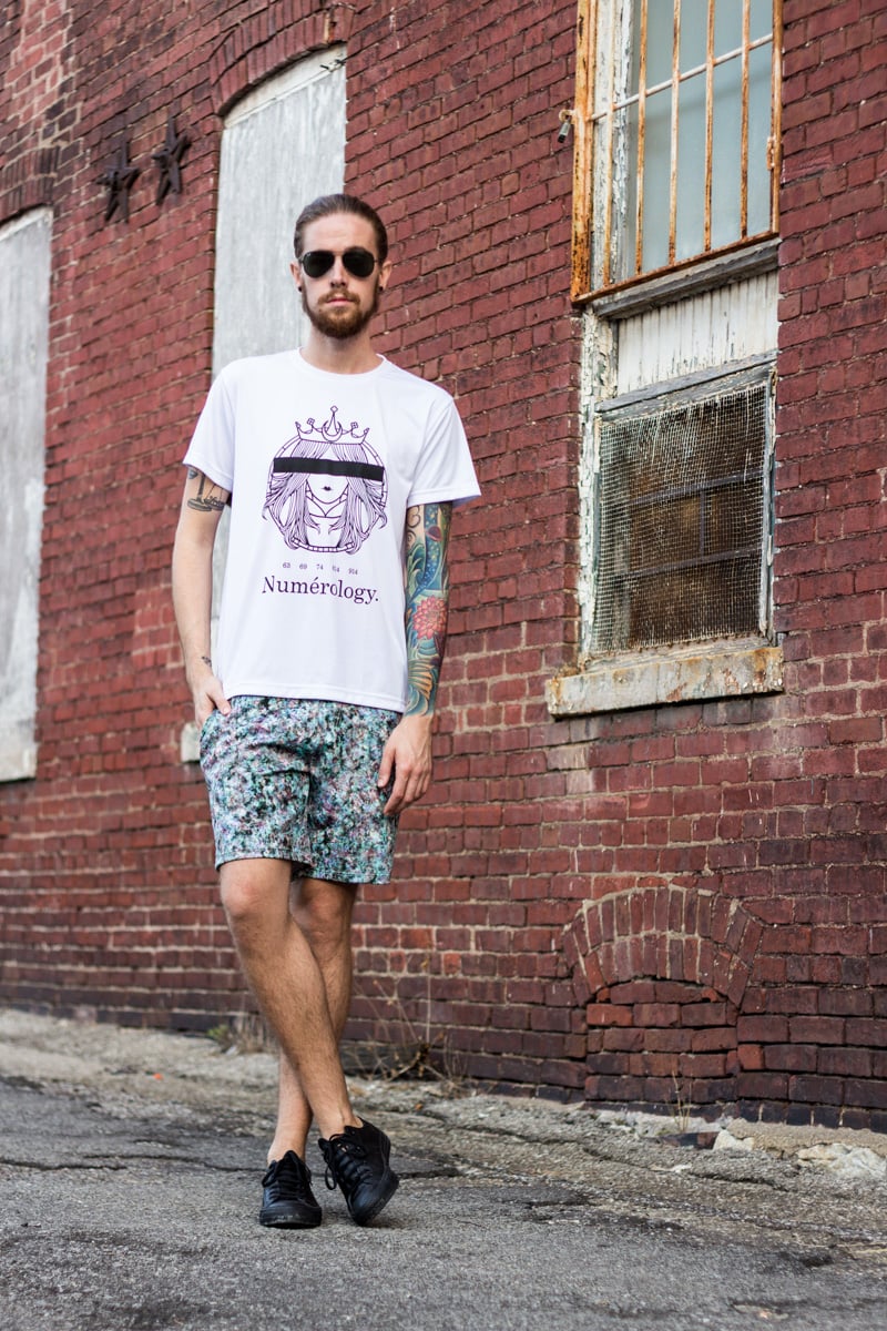 The Kentucky Gent, a men's fashion and life style blogger, in Numerology Tee, Topman Neoprene Shorts, Converse Chuck Taylors, and Ray-Ban Aviator Sunglasses.