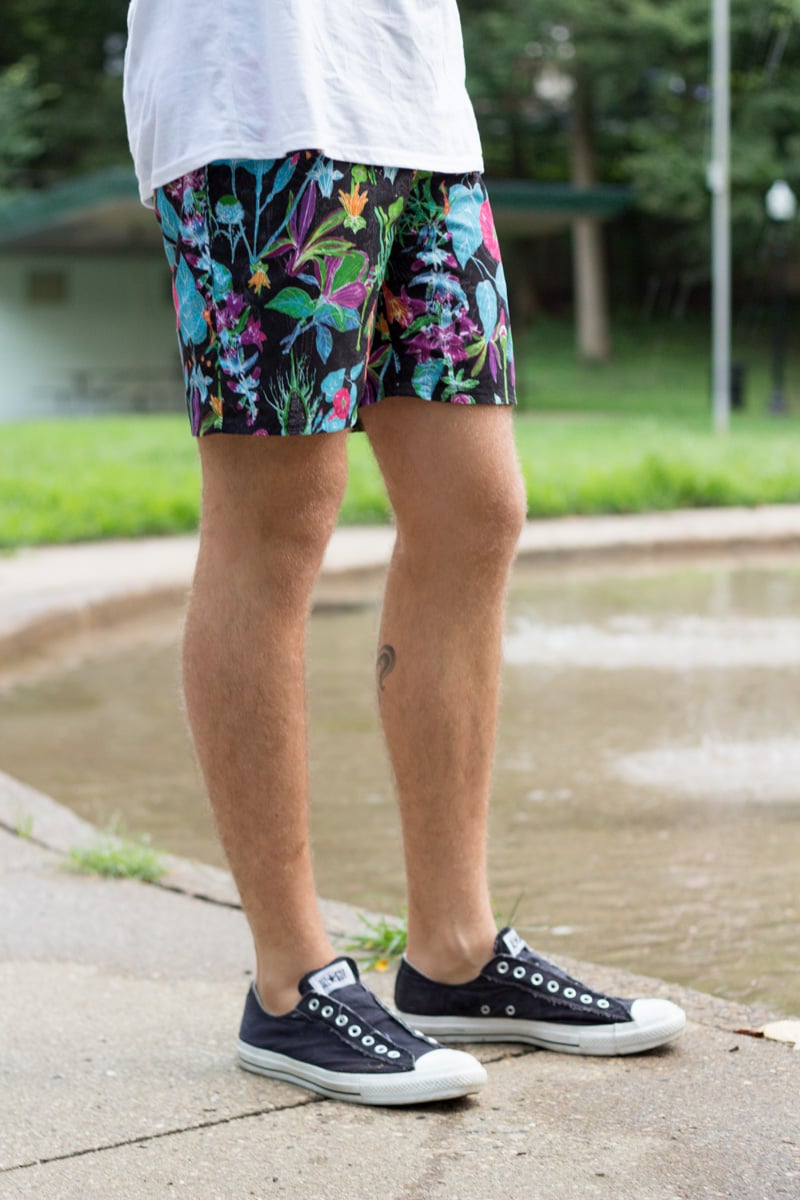 The Kentucky Gent, a men's fashion and life style blogger, in Topman Muscle Shirt, Ambig Floral Shorts, and Converse Chuck Taylors.