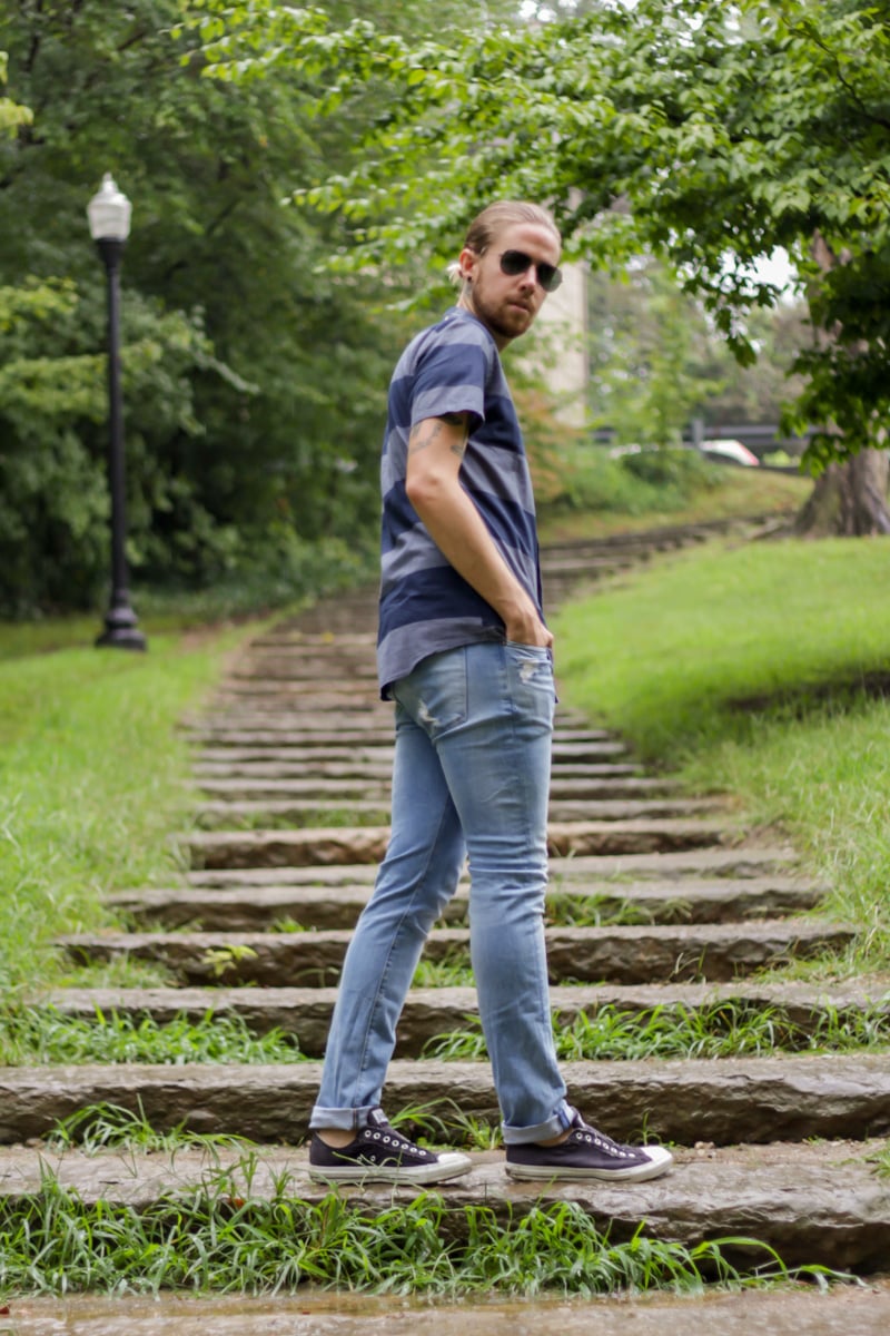 The Kentucky Gent, a men's fashion and life style blogger, in Ambig Striped Short Sleeve Button Up Shirt, H&M Light Wash Denim Jeans, Converse Chuck Taylors, and Ray-Ban Aviator Sunglasses from East Dane.