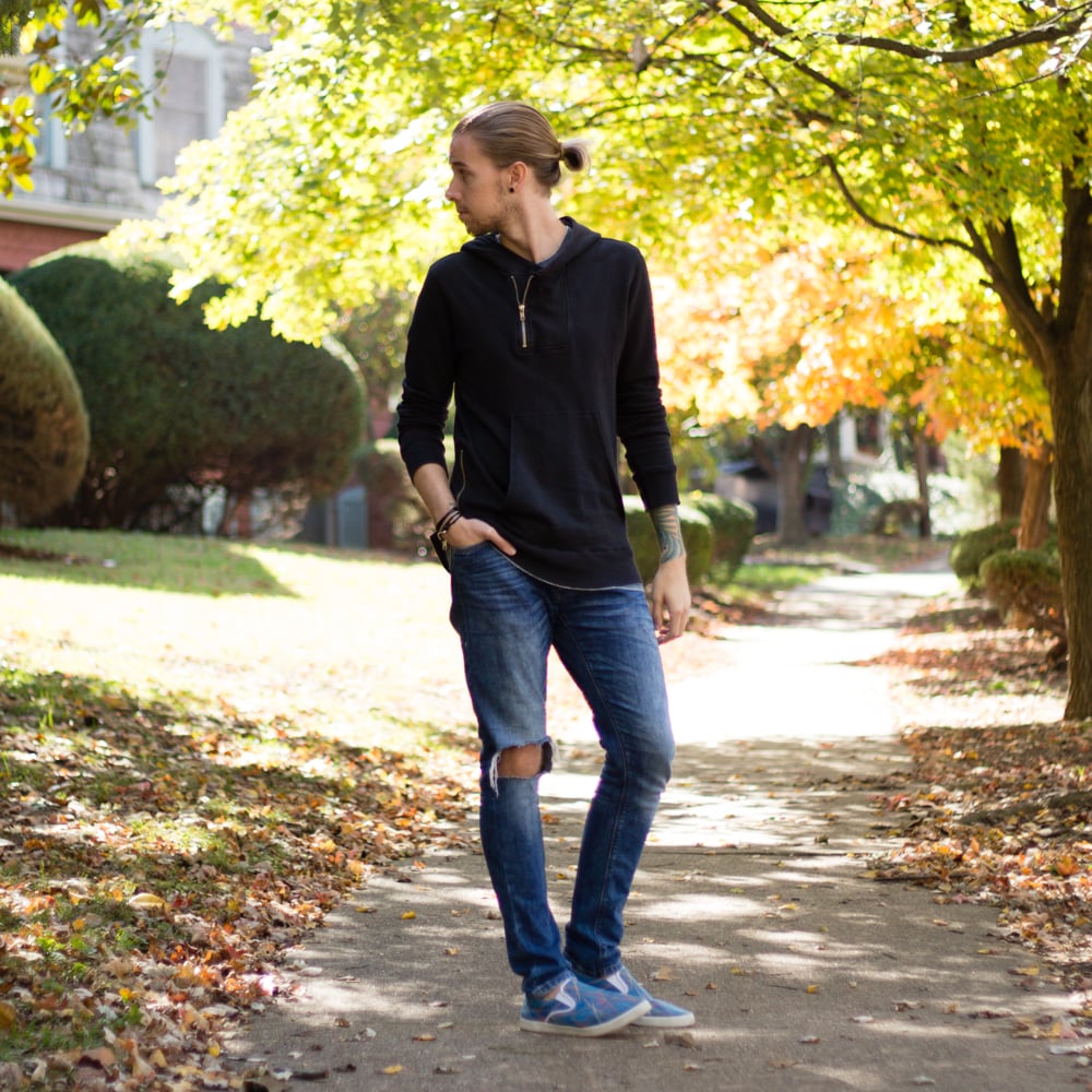 The Kentucky Gent, a men's fashion and lifestyle blogger, in a Kill City Hoodie, Narrows Tank Top, Zara Jeans, Bucketfeet Slip On Shoes, Ray-Ban Aviator Sunglasses, and Miansai wrap bracelet.