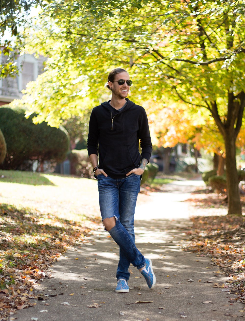 The Kentucky Gent, a men's fashion and lifestyle blogger, in a Kill City Hoodie, Narrows Tank Top, Zara Jeans, Bucketfeet Slip On Shoes, Ray-Ban Aviator Sunglasses, and Miansai wrap bracelet.