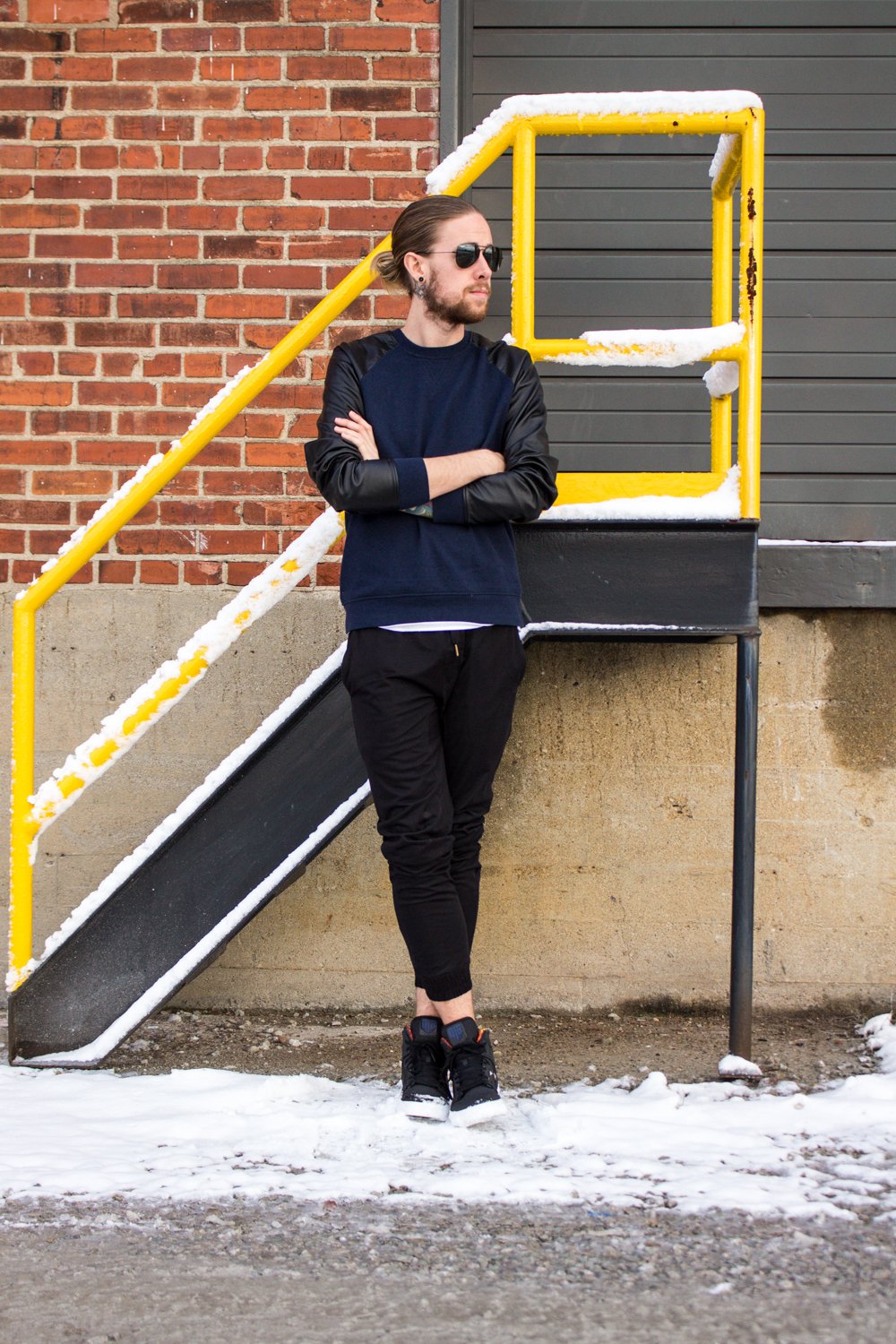 The Kentucky Gent, a Louisville, Kentucky life and style blogger, in Narrows Sweatshirt, Zanerobe Das Boro Mesh Joggers, Supra District 13 Vaider Sneakers, and Ray-Ban Aviator Sunglasses. 