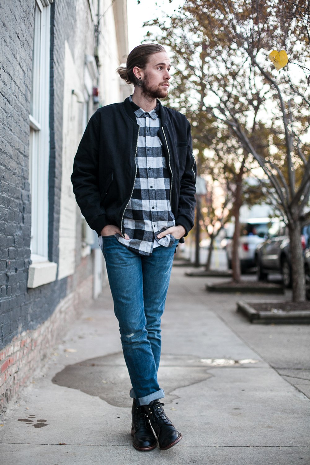 The Kentucky Gent, a Louisville, Kentucky life and style blogger, in Salt Valley Plaid Shirt, Cheap Monday Bomber Jacket, Levi's 511 Jeans, Trask Union Boots, and Richer Poorer Socks.