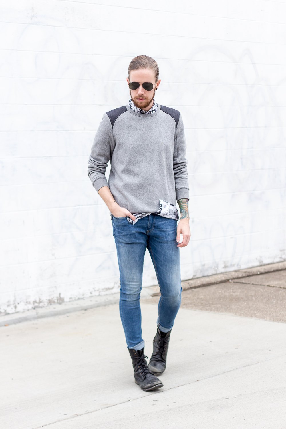 The Kentucky Gent, a Louisville, Kentucky men's life and style blogger, in Topman Floral Shirt, H&M Sweatshirt, H&M Skinny Jeans, Steve Madden Troopah Boots, and Ray-Ban Aviator Sunglasses.