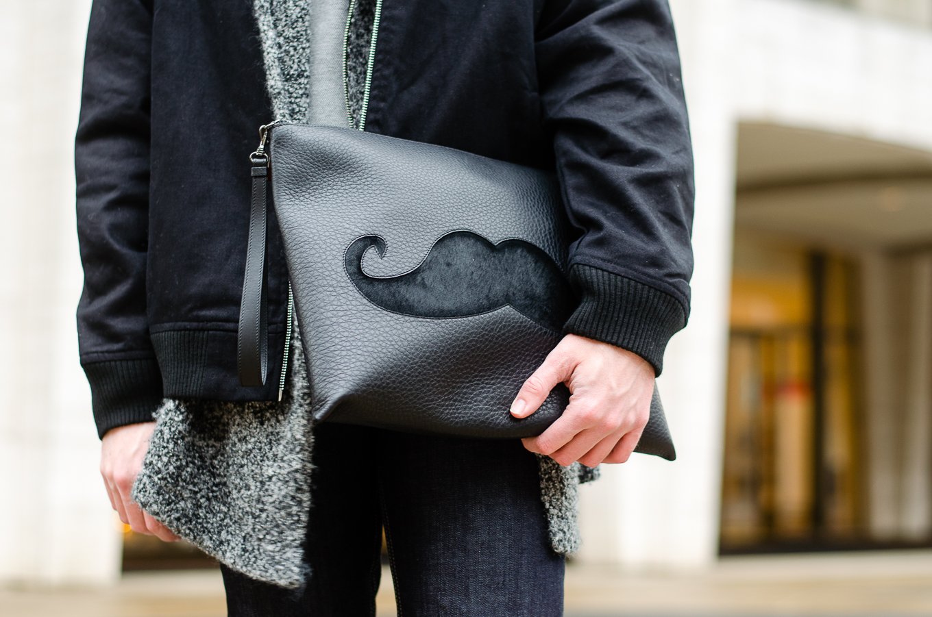 The Kentucky Gent, a men's fashion and lifestyle blogger, spends his first day of NYFW at Lincoln Center in Christian Louboutin sneakers and bag.