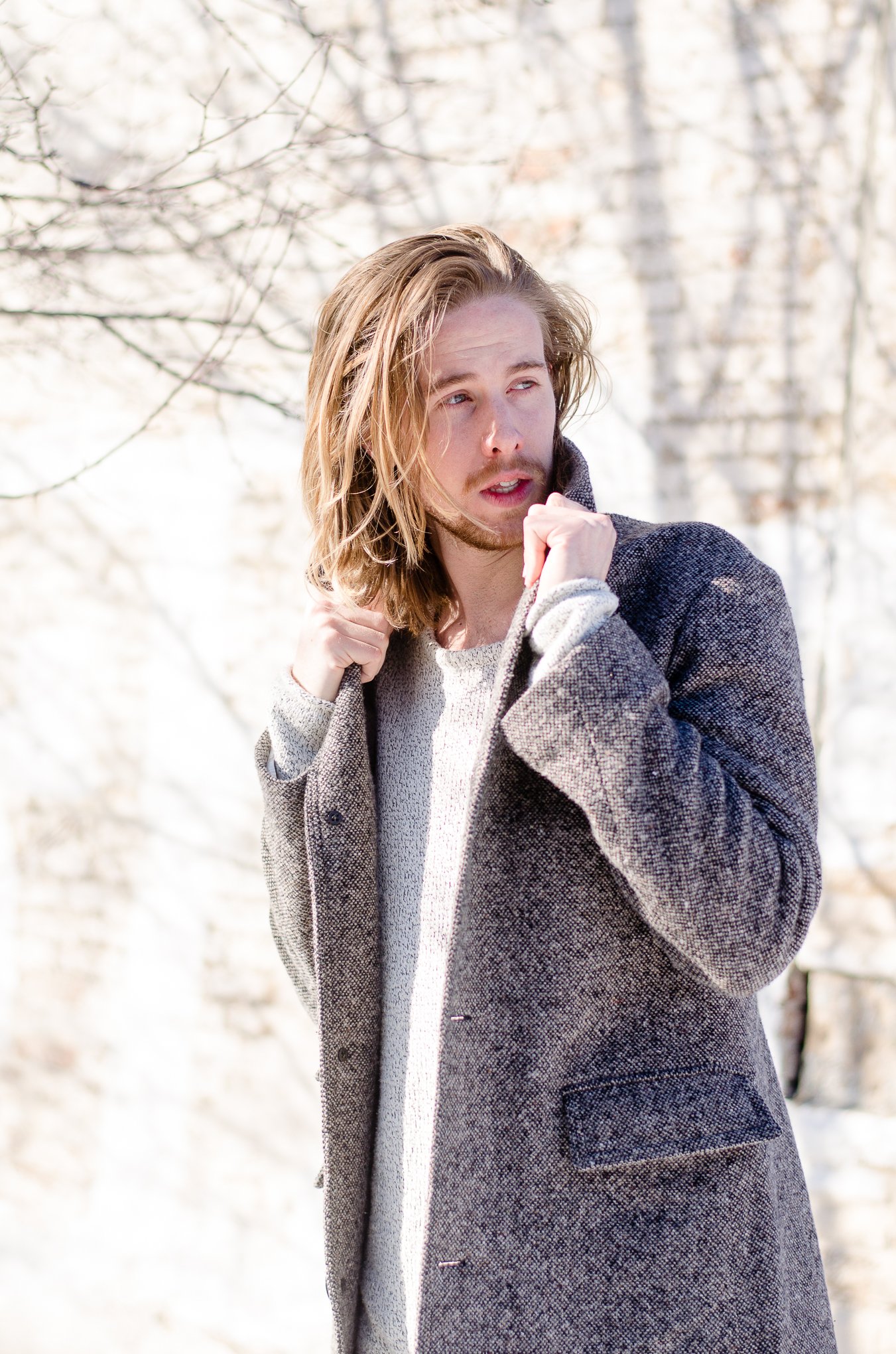 The Kentucky Gent, a men's fashion and lifestyle blogger, doubles up in  an H&M sweater and Billy Reid coat.